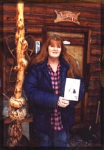 Tok poet laureate, Donna Blasor-Bernhardt with her Alaskan history book, Tok the Real Story 